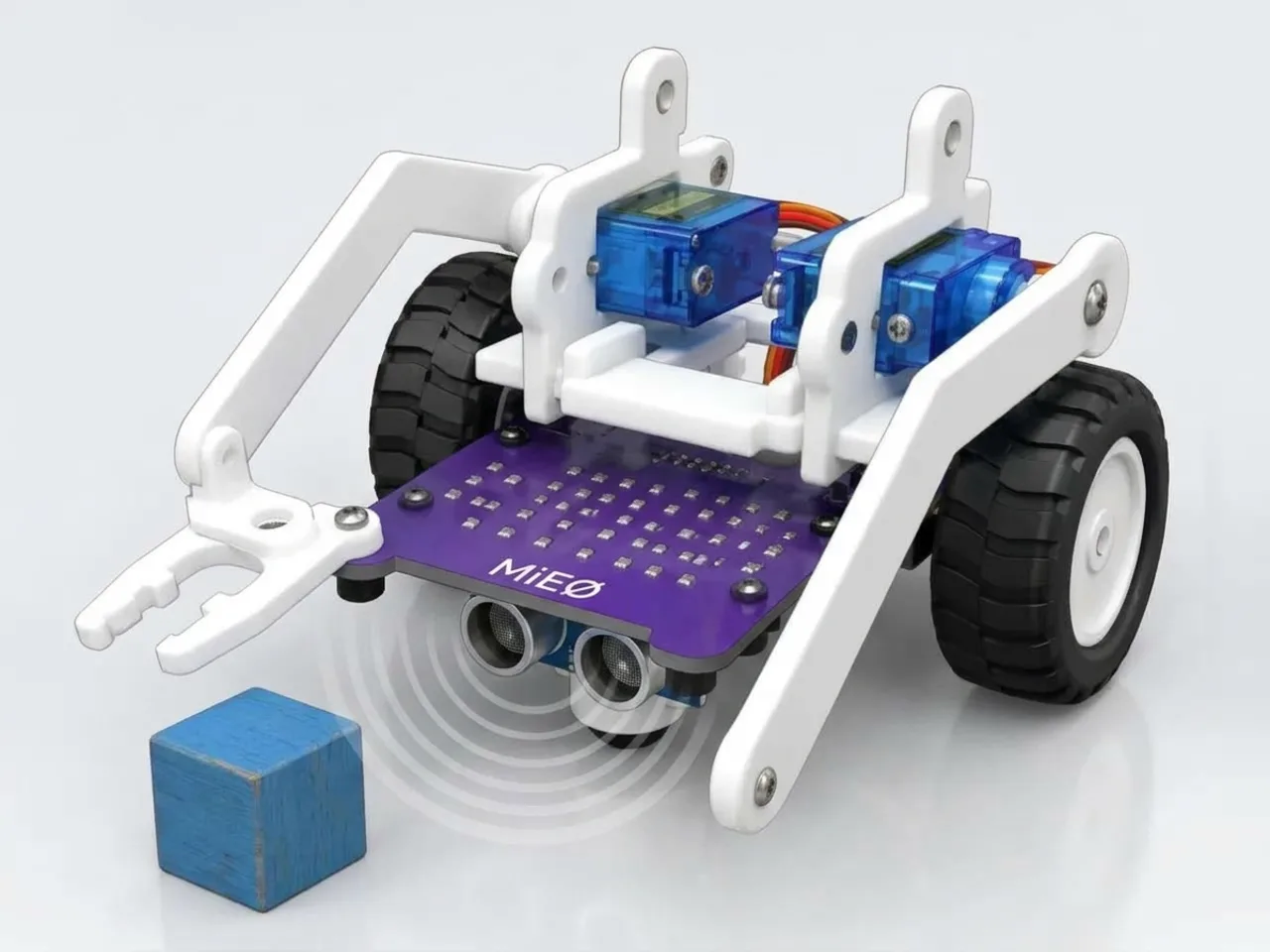MIEO gripper arm reaching for a block that its ultrasonic sensor has spotted