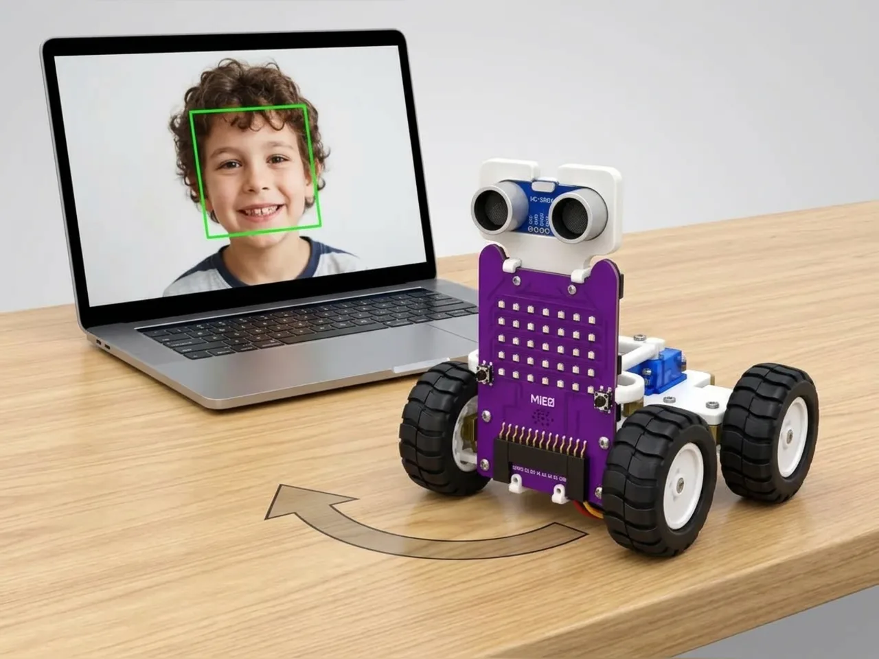 MIEO turning towards a child's face that a laptop camera is tracking