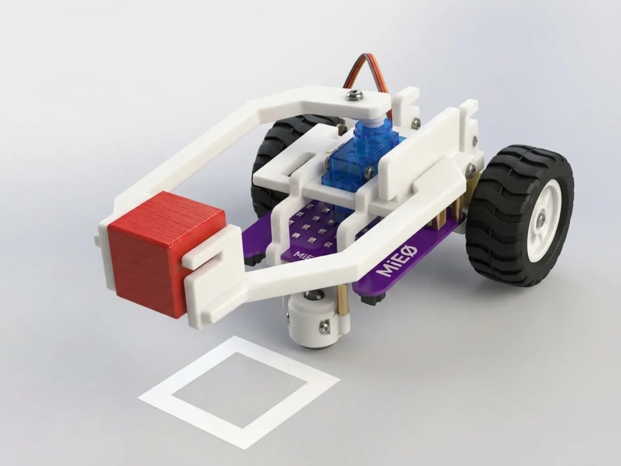 MIEO with a servo gripper arm lifting a small block