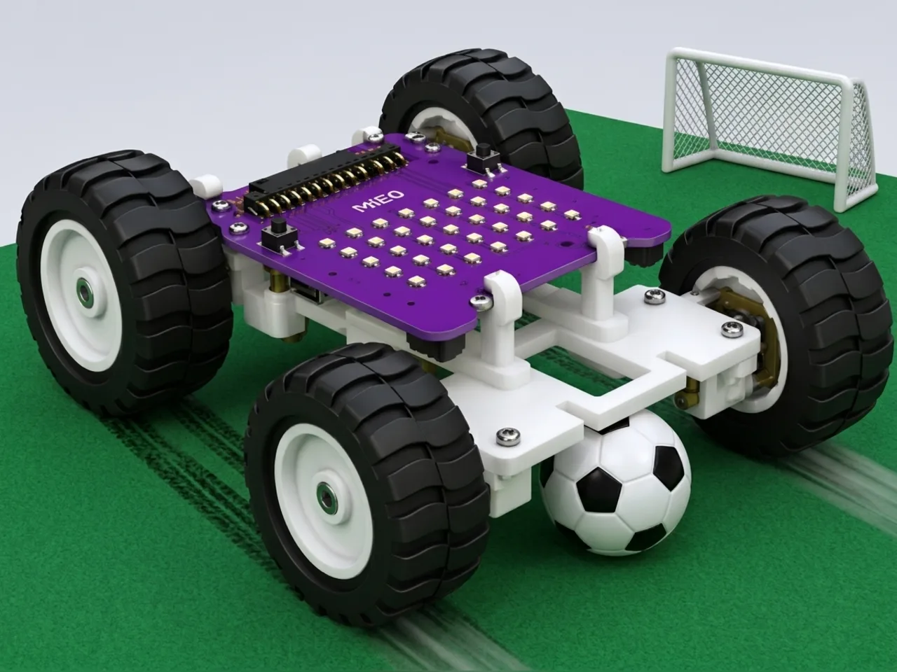 Four-wheel MIEO pushing a small ball towards a toy goal