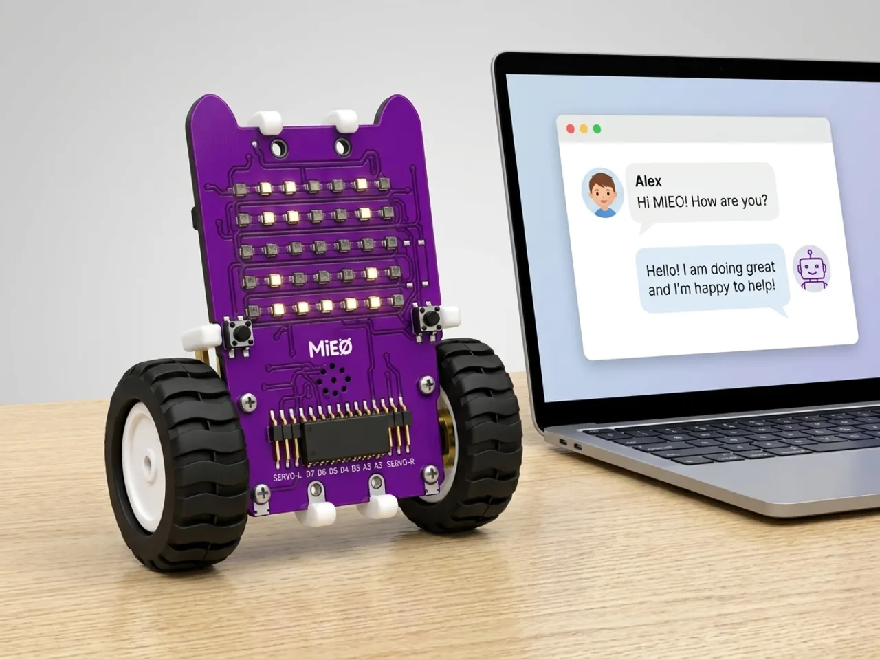 MIEO beside a laptop showing a chat between a child and the robot