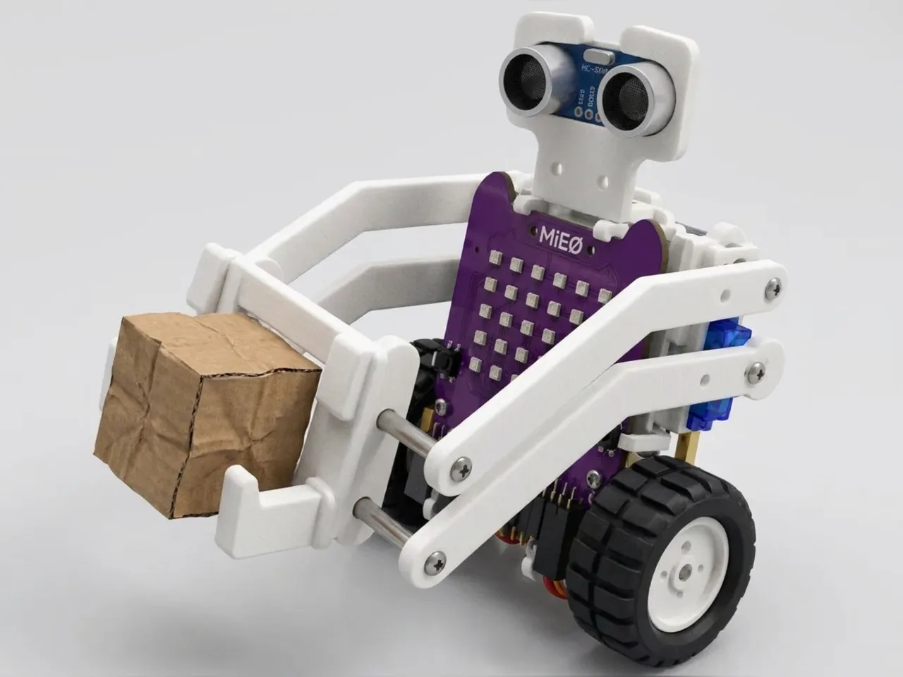 MIEO built as a Wall-E style robot with forklift arms and sensor eyes